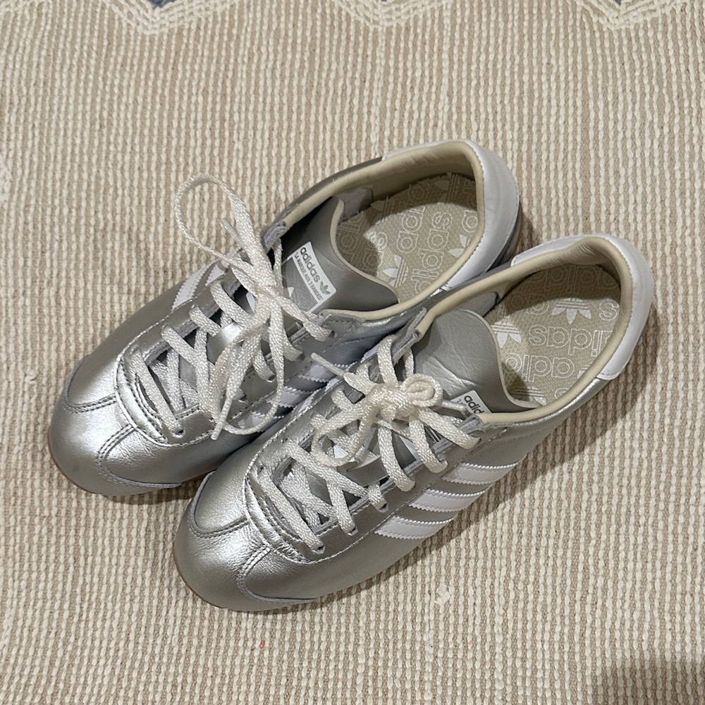 Silver Adidas sneakers